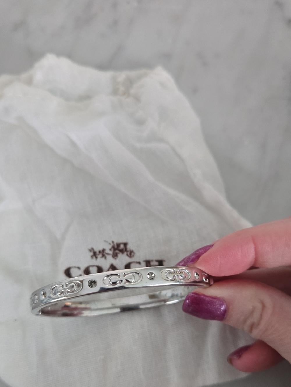 COACH Silver-Tone Logo Crystal Bangle Bracelet